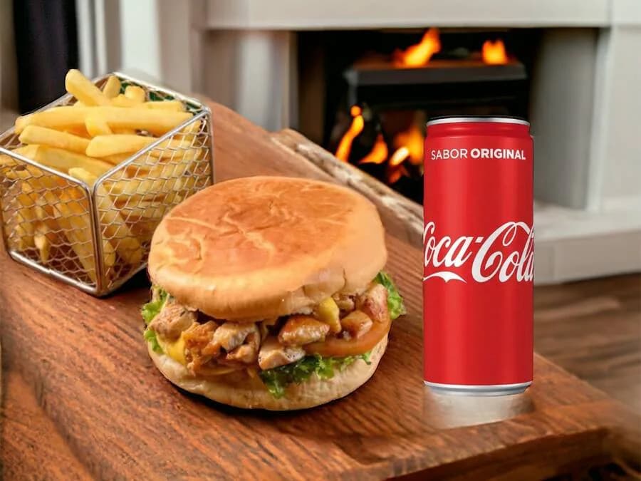 X Filé de Frango + 100g de Batata Frita + Coca Lata
